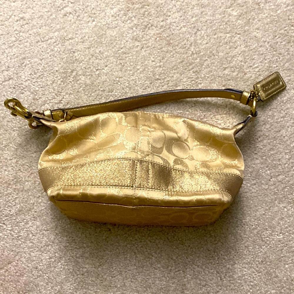 Smalll Gold Coach Handbag